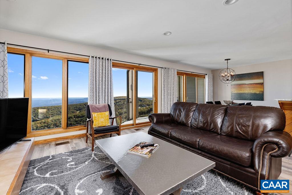 1581 Vistas Roseland, VA 22967 - Photo 7 of 53 a living room with furniture and a large window