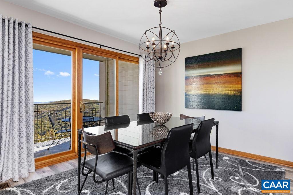 1581 Vistas Roseland, VA 22967 - Photo 8 of 53 a view of a dining room with furniture window and outside view