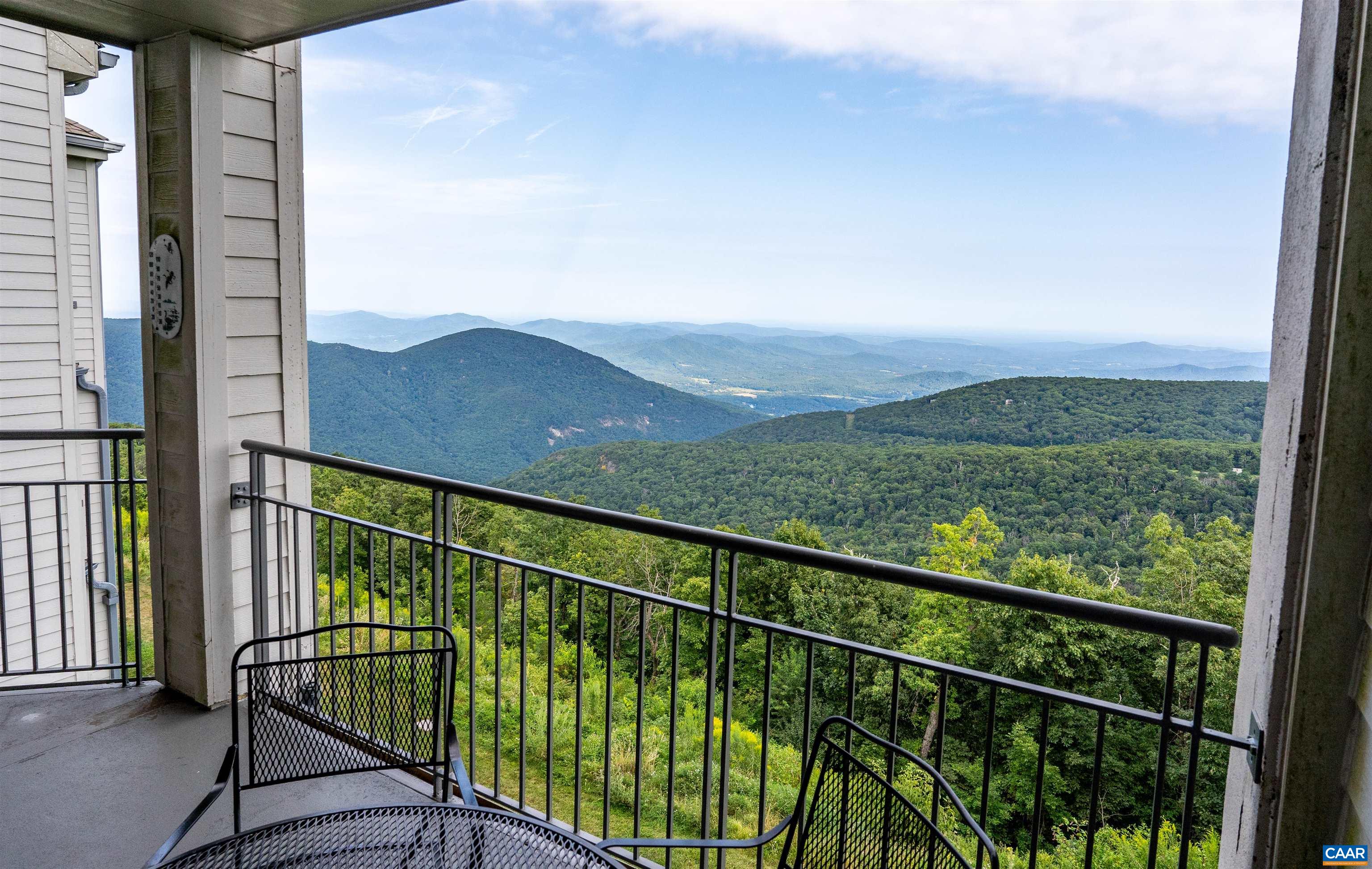 1581 Vistas Roseland, VA 22967 - Photo 10 of 53 a view of balcony with wooden floor & fence