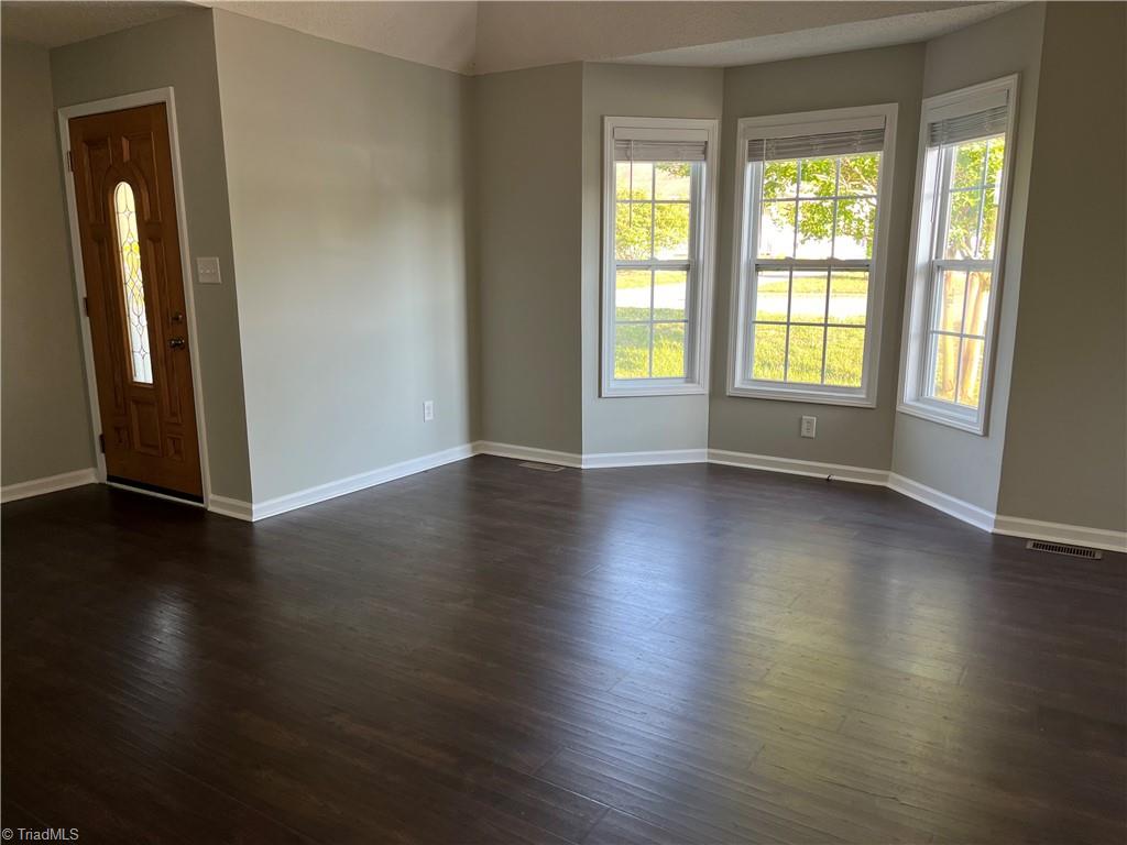 4740 Beckel Road Winston-Salem, NC 27127 - Photo 6 of 33 Den w/ Bay window