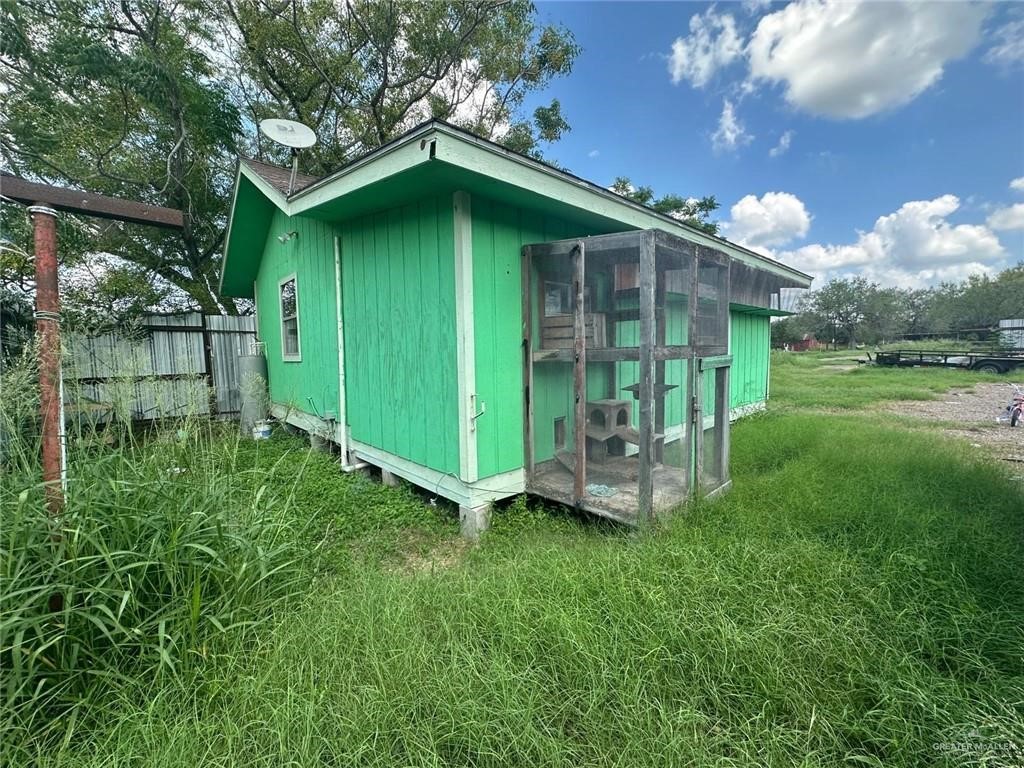 711 East Rice Street Falfurrias, TX 78355 - Photo 10 of 11 a view of a house with a yard