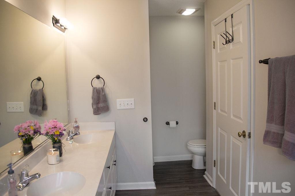 209 Chapwith Road Garner, NC 27529 - Photo 22 of 25 Master bathroom with separate tub and shower