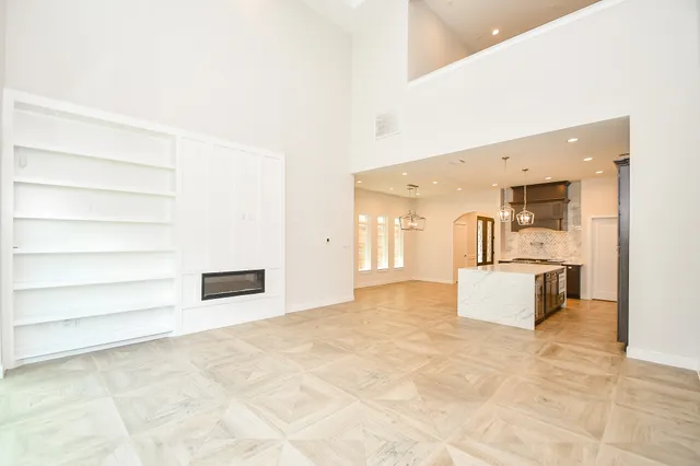 a view of kitchen with furniture and wooden floor