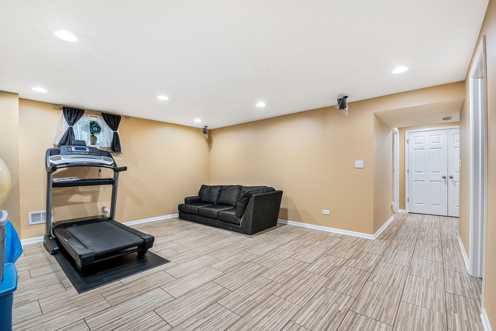1612 Percy Lane Itasca, IL 60143 - Photo 15 of 20 a living room with furniture and a wooden floor