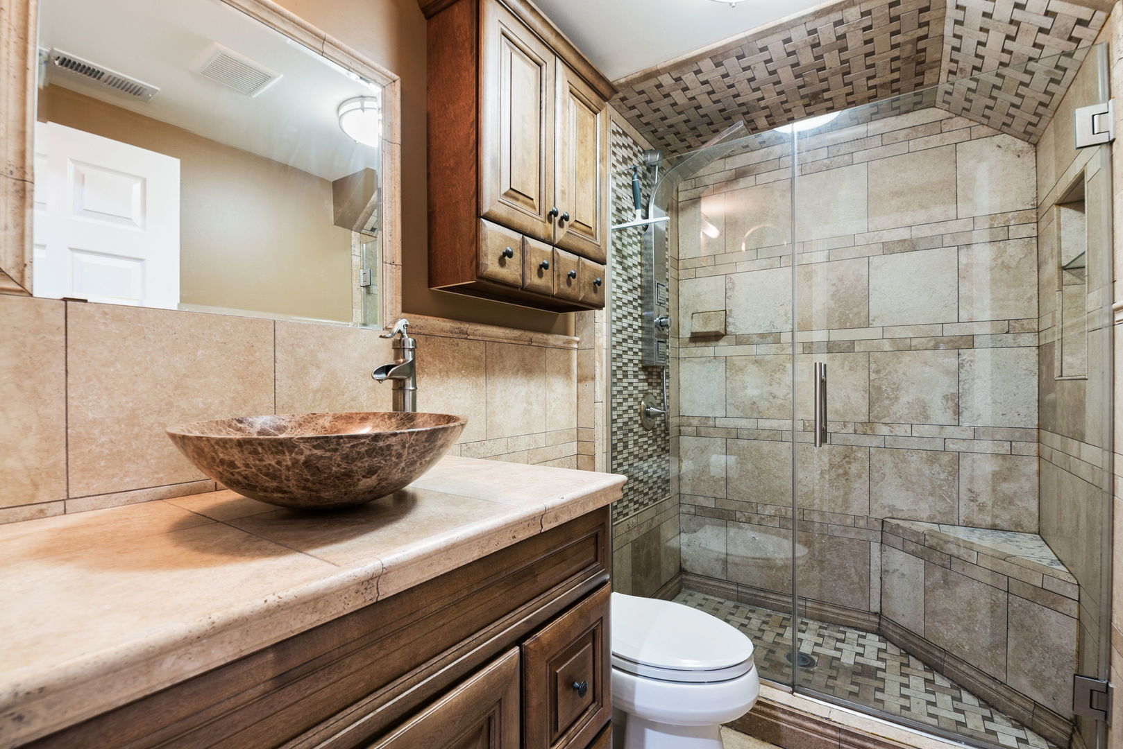 1612 Percy Lane Itasca, IL 60143 - Photo 17 of 20 a bathroom with a sink a toilet and shower