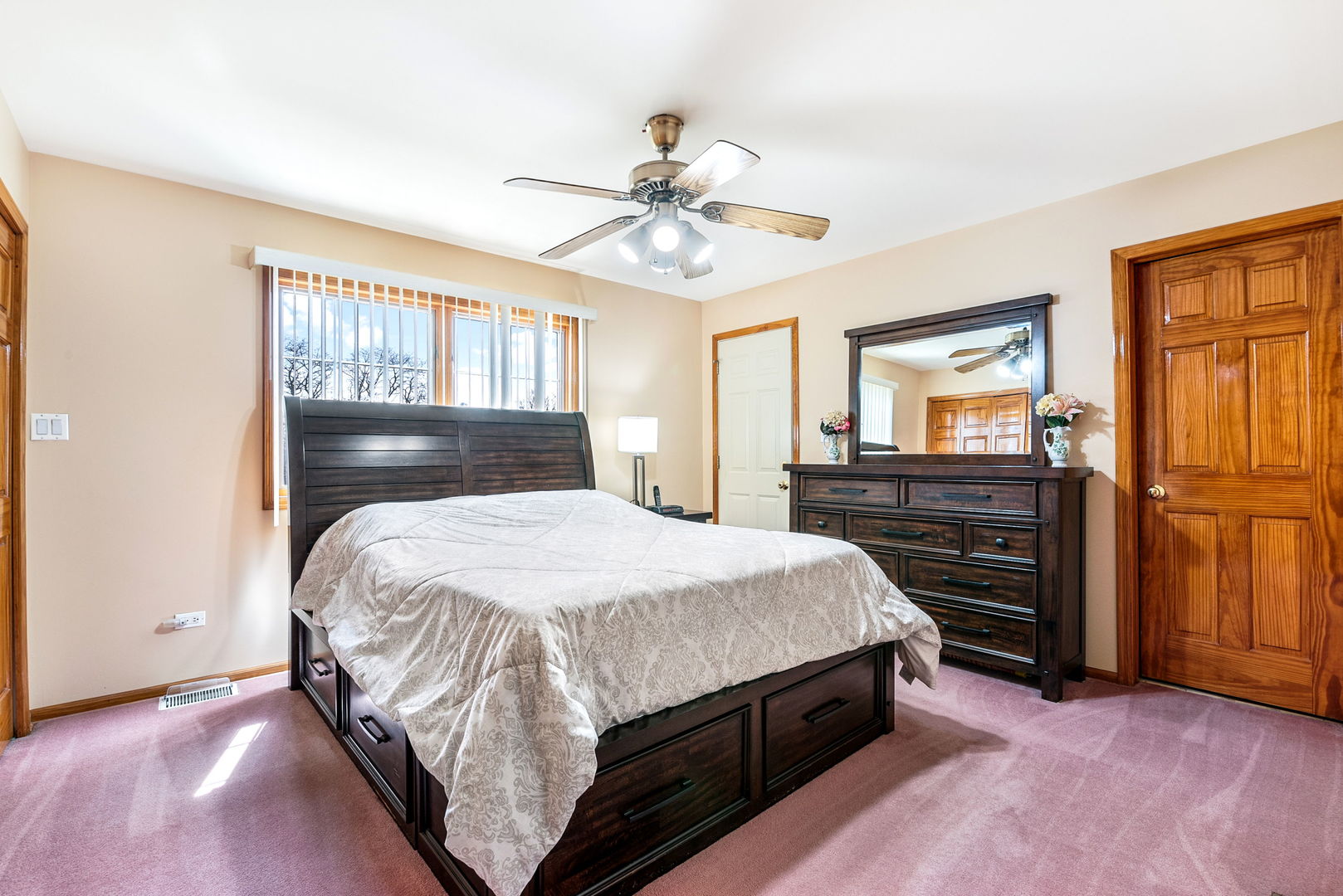 1612 Percy Lane Itasca, IL 60143 - Photo 8 of 20 a bedroom with a bed and wooden floor