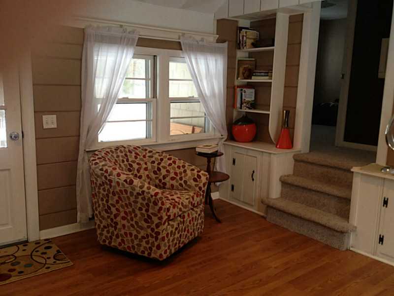 293 Hope Furnace Road Scituate, RI 02831 - Photo 8 of 14 Den/Family/Great Room. Another view of this family room. Windows look out to farmers porch. Stairs lead up to two of the three bedrooms.