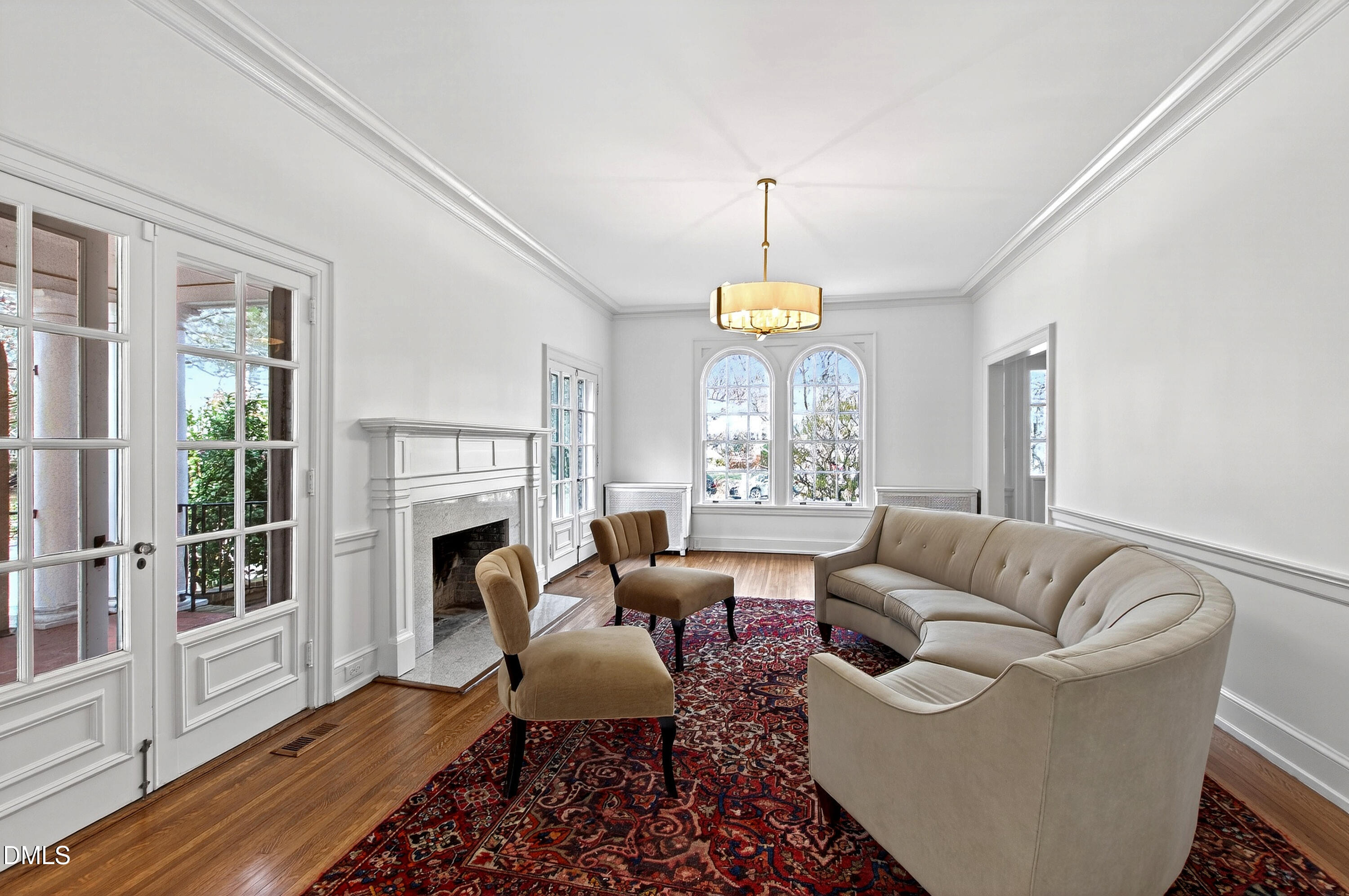 1313 College Place Raleigh, NC 27605 - Photo 23 of 71 a living room with furniture and a fireplace