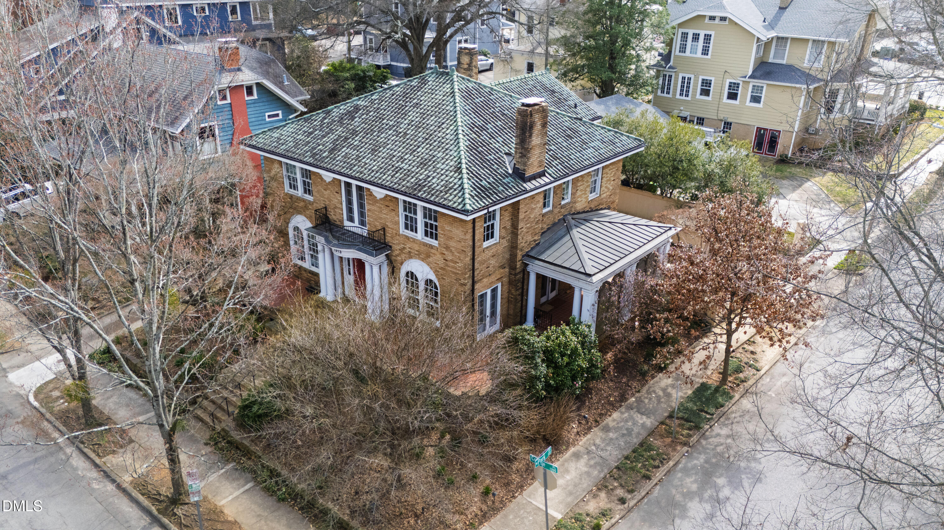 1313 College Place Raleigh, NC 27605 - Photo 8 of 71 a aerial view of a house with a yard and potted plants