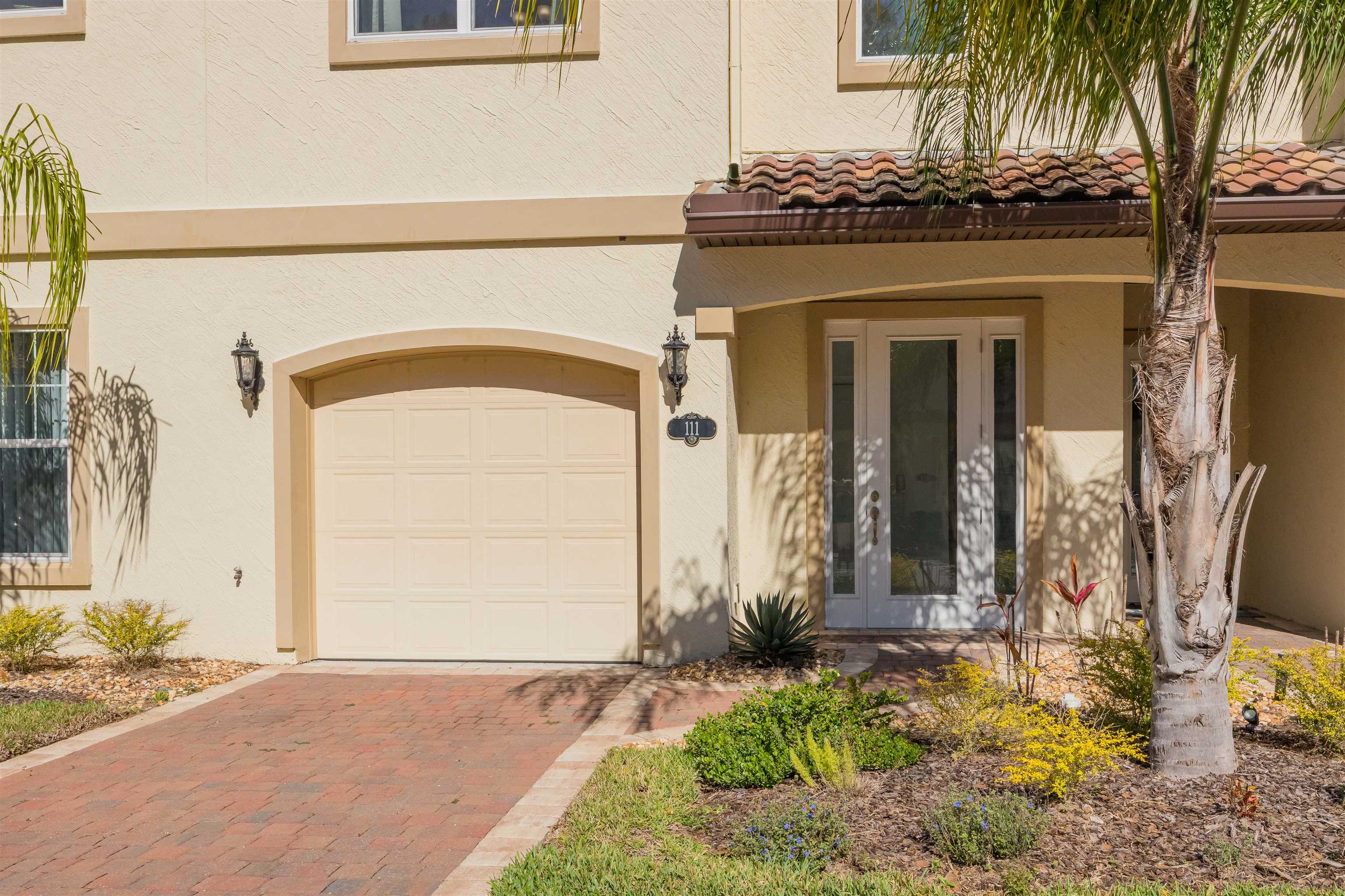 111 CanyonTrail St. Augustine, FL 32086 - Photo 2 of 55 a front view of a house with a yard