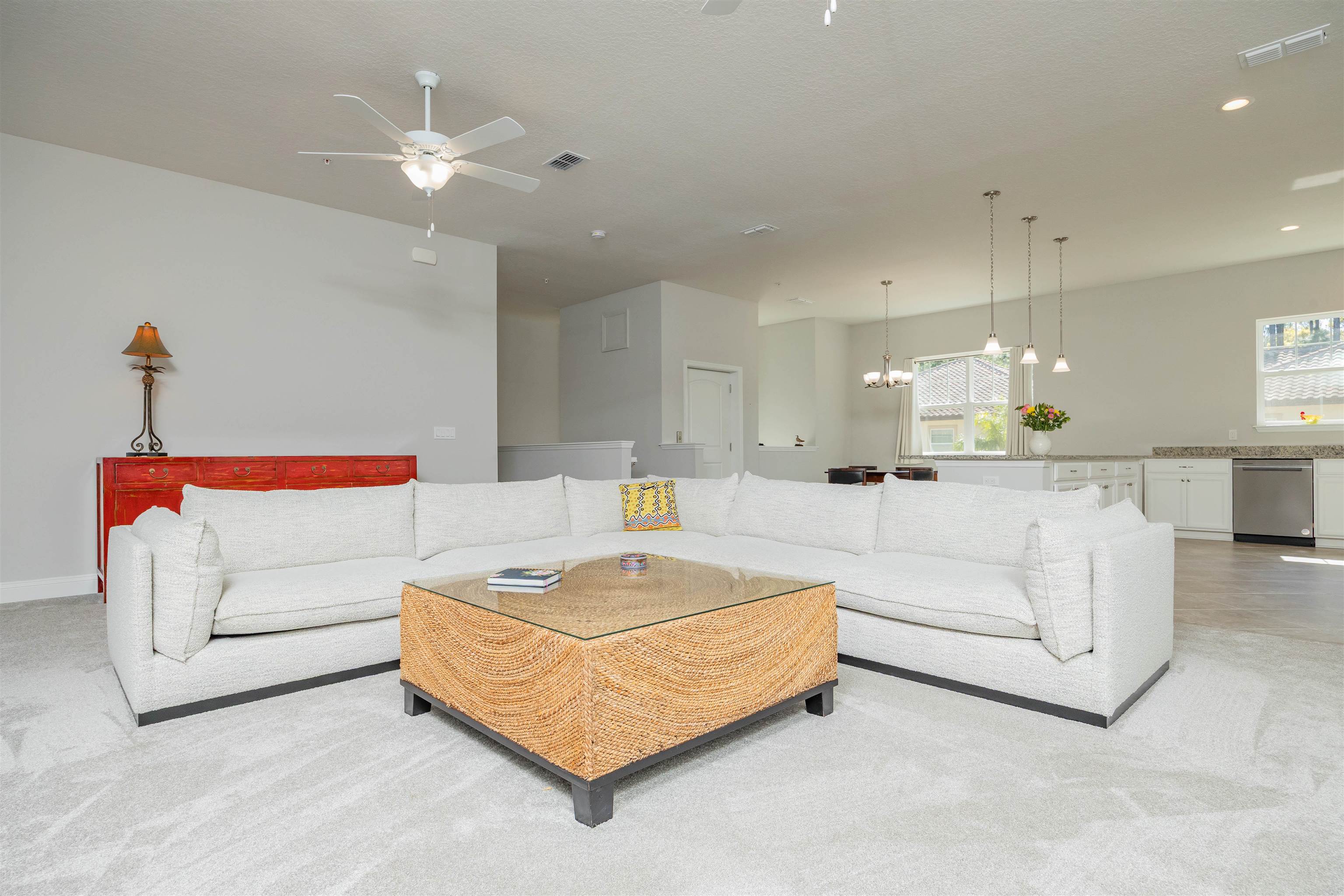 111 CanyonTrail St. Augustine, FL 32086 - Photo 31 of 55 a bed room with a bed and a chandelier