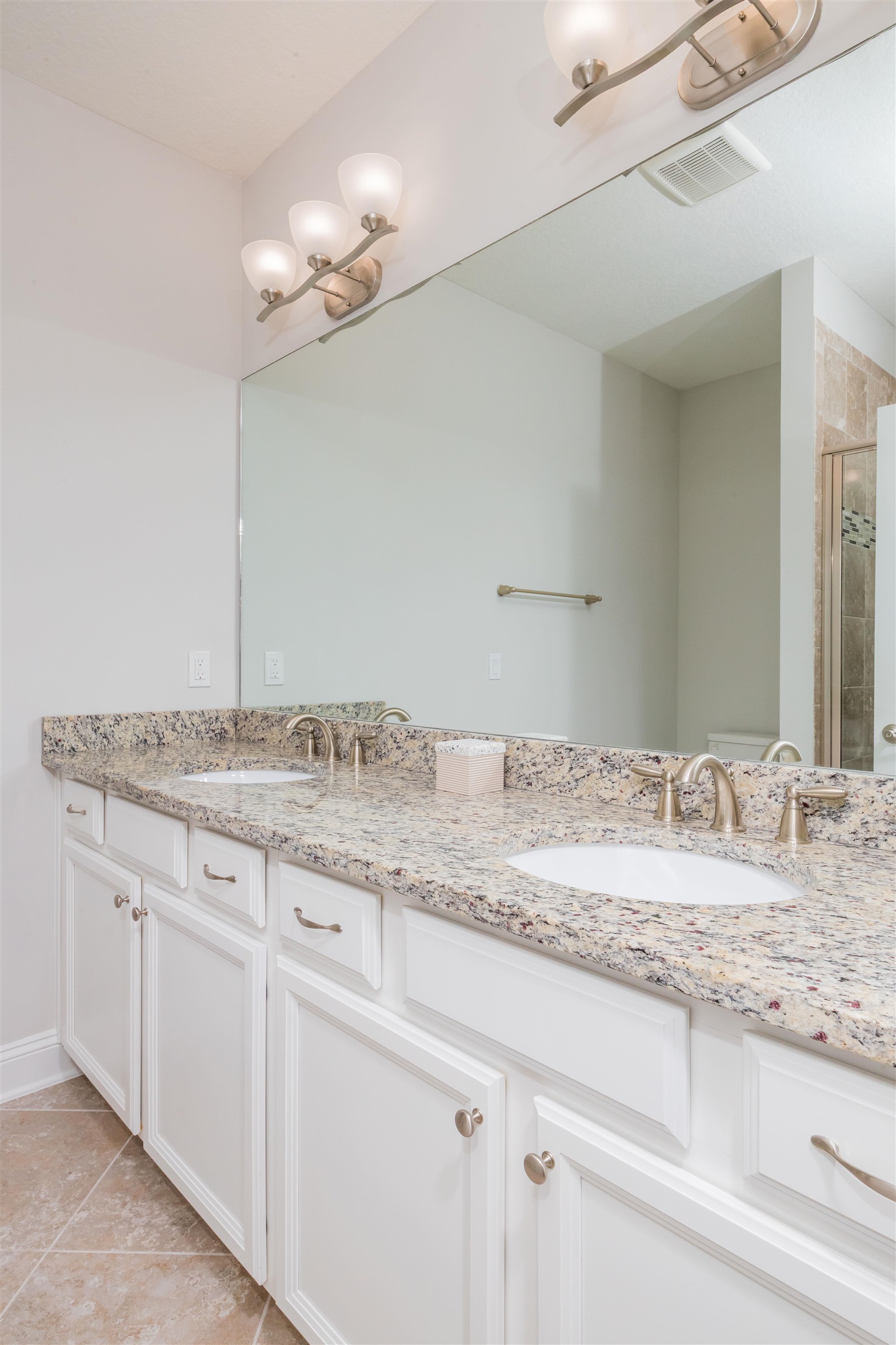 111 CanyonTrail St. Augustine, FL 32086 - Photo 37 of 55 a bathroom with a granite countertop sink and a mirror
