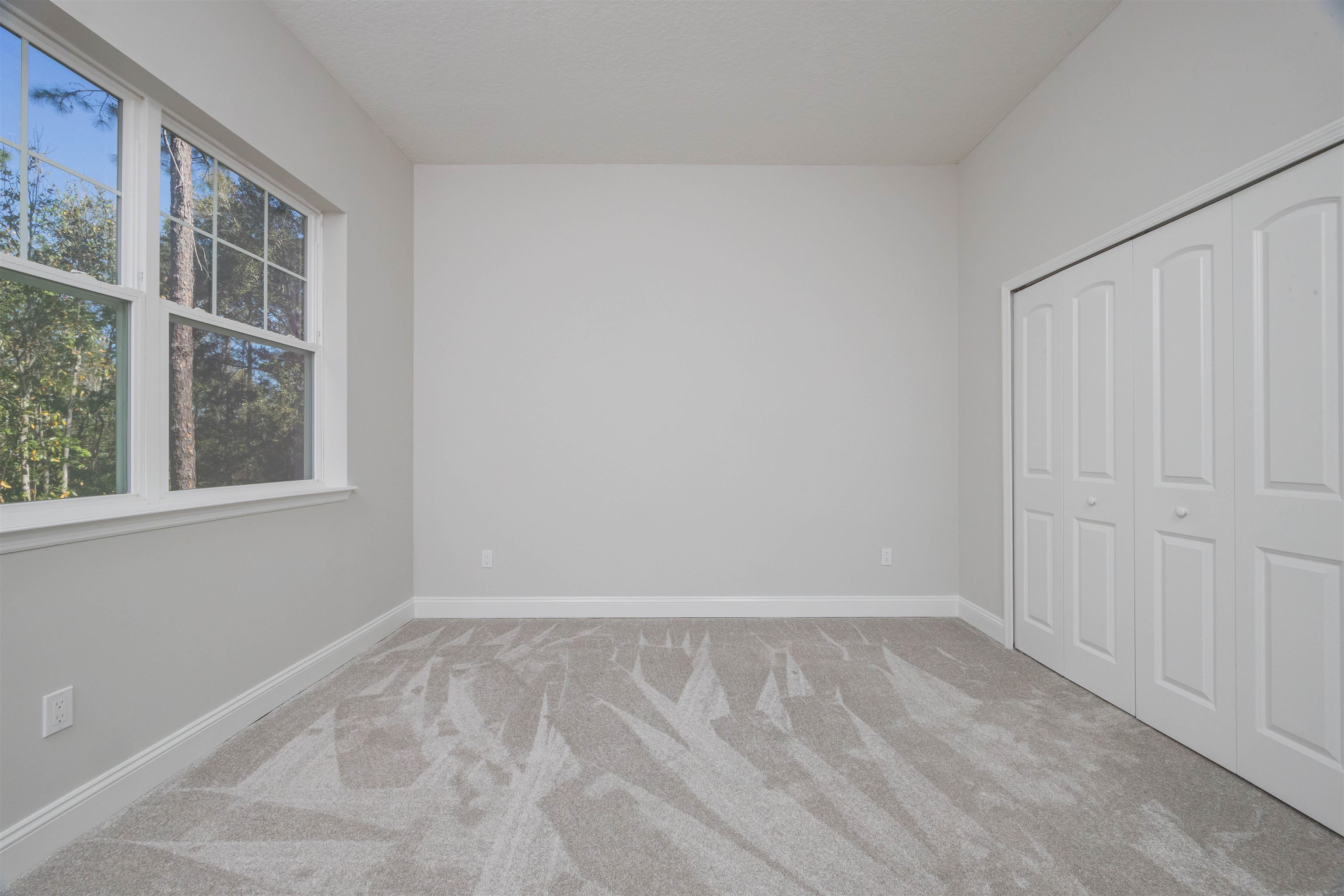 111 CanyonTrail St. Augustine, FL 32086 - Photo 40 of 55 an empty room with a window