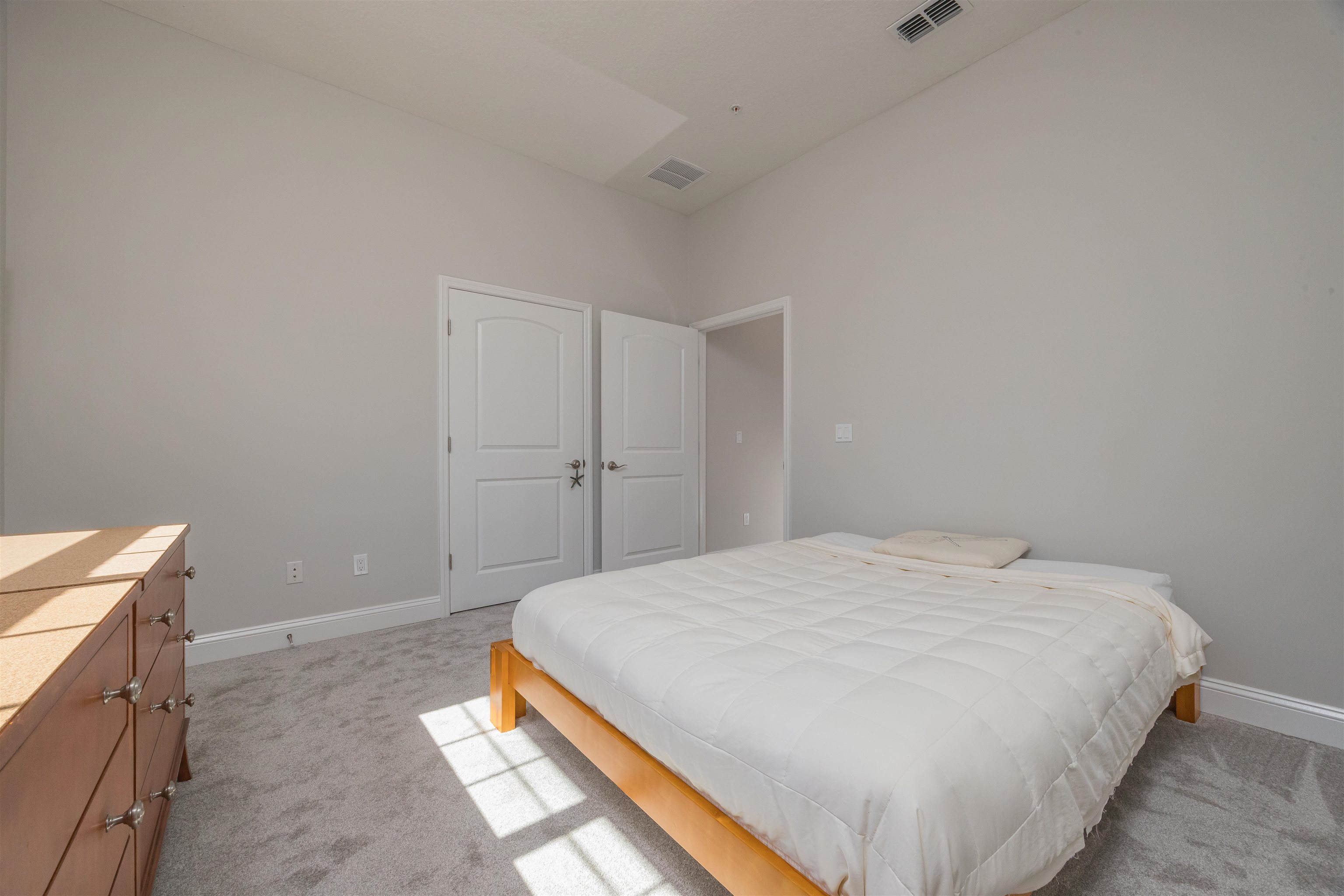 111 CanyonTrail St. Augustine, FL 32086 - Photo 46 of 55 a bedroom with a bed and a cabinets