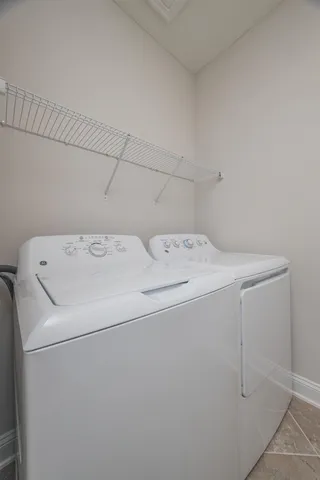 a view of a patio with swimming pool