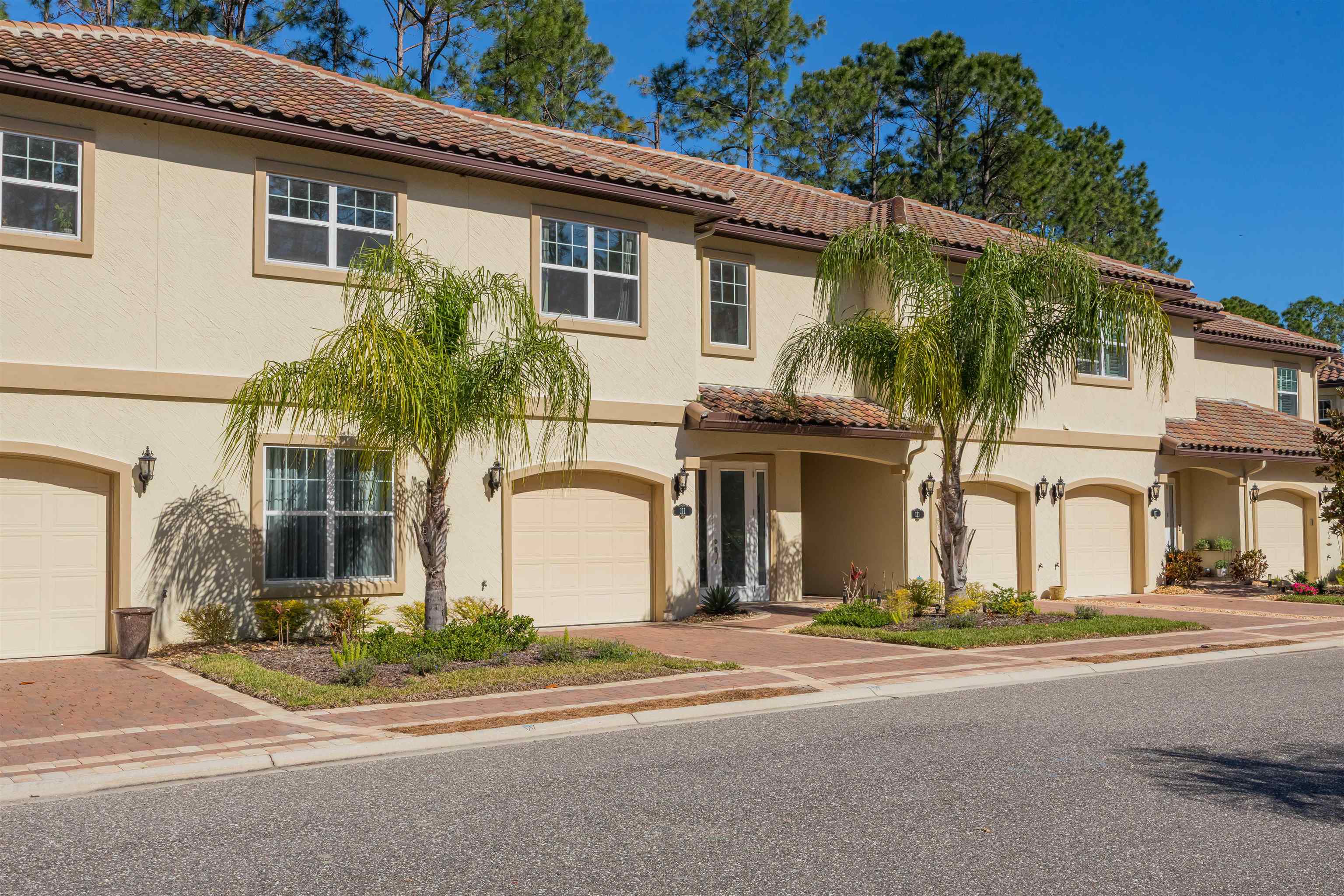 111 CanyonTrail St. Augustine, FL 32086 - Photo 8 of 55 a front view of a house with a garden
