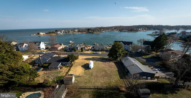 an aerial view of a house with a garden
