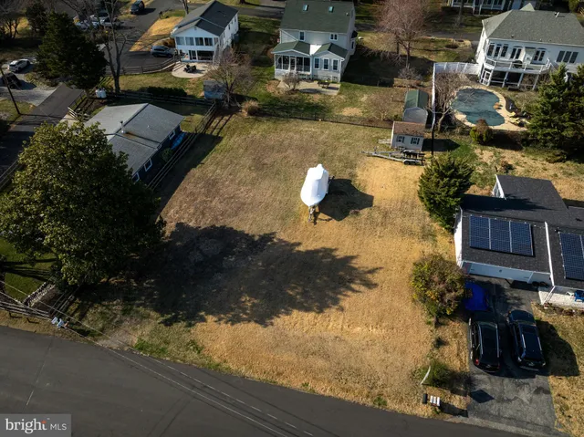 a view of swimming pool with sitting area