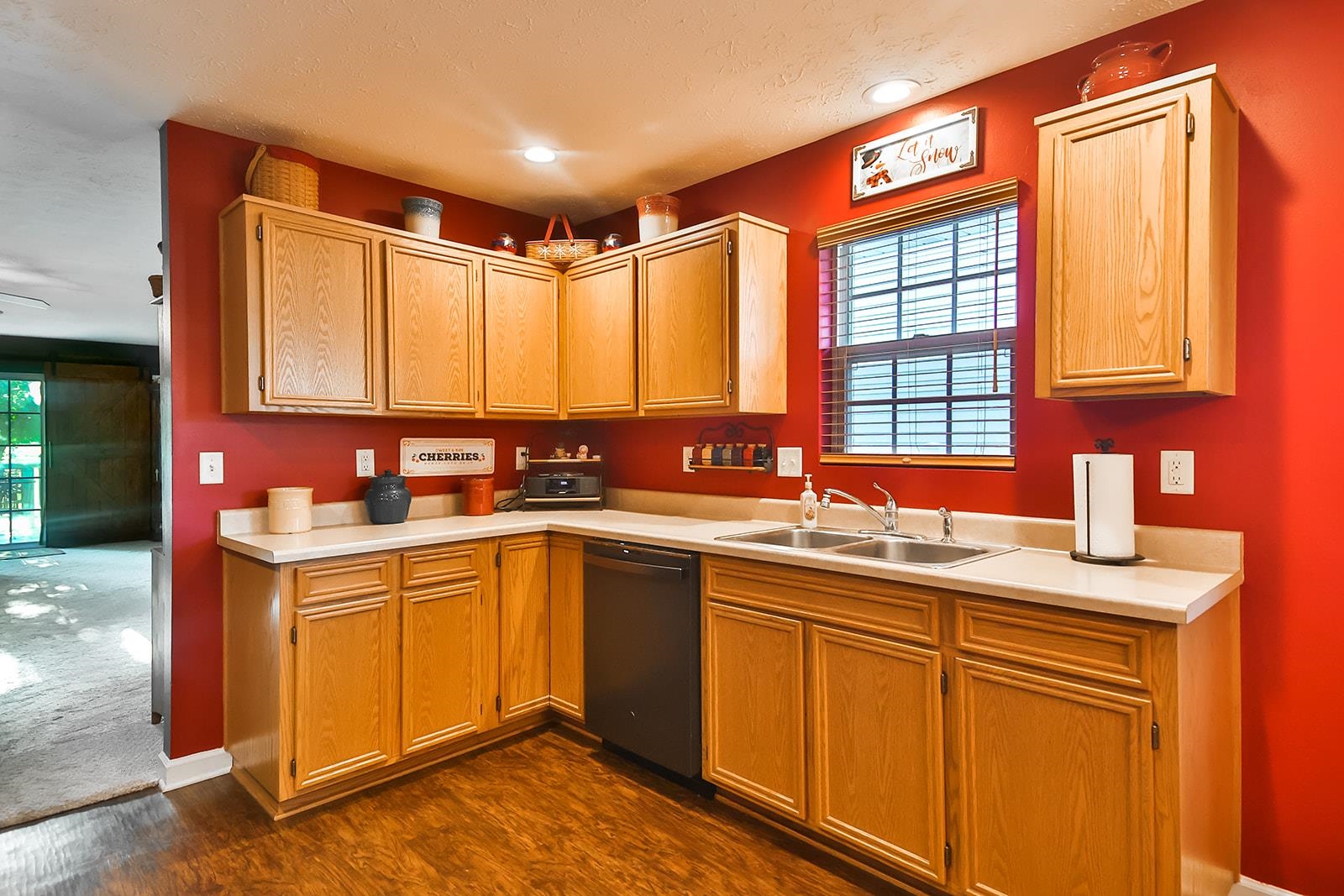 621 Grove Street Pecatonica, IL 61063 - Photo 18 of 26 a kitchen with a sink stove and cabinets