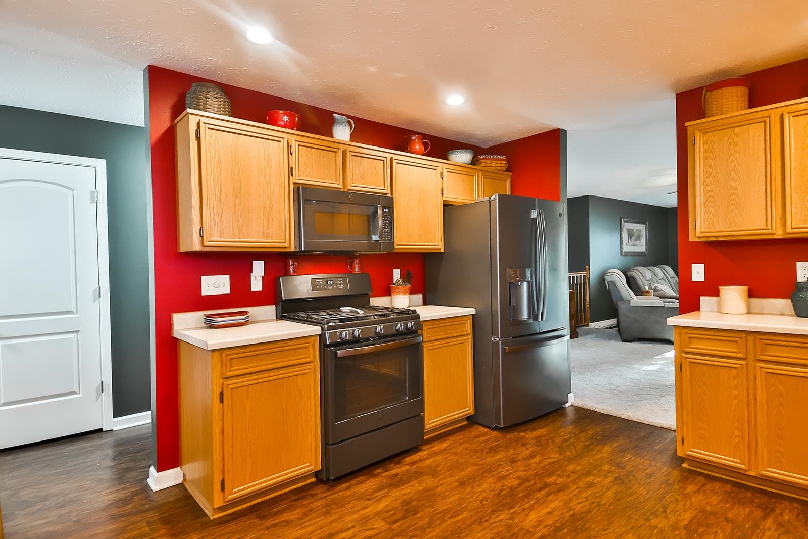 621 Grove Street Pecatonica, IL 61063 - Photo 19 of 26 a kitchen with stainless steel appliances granite countertop a refrigerator stove and sink
