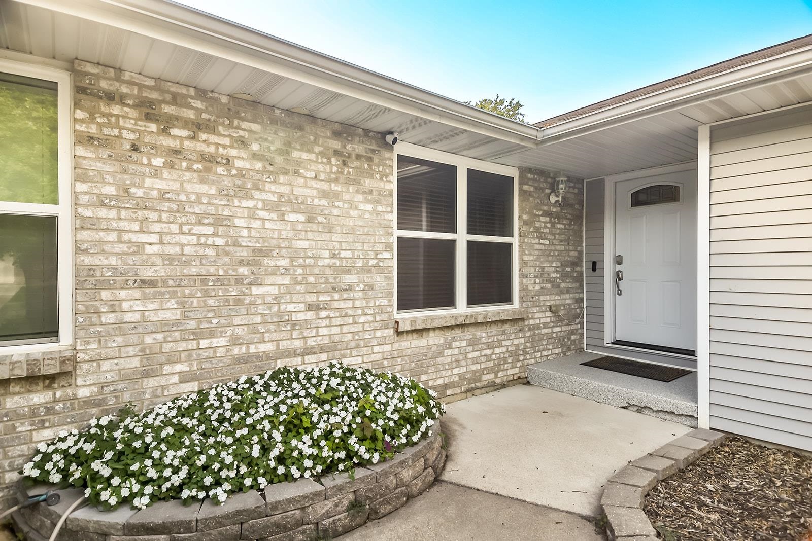 621 Grove Street Pecatonica, IL 61063 - Photo 3 of 26 a front view of a house