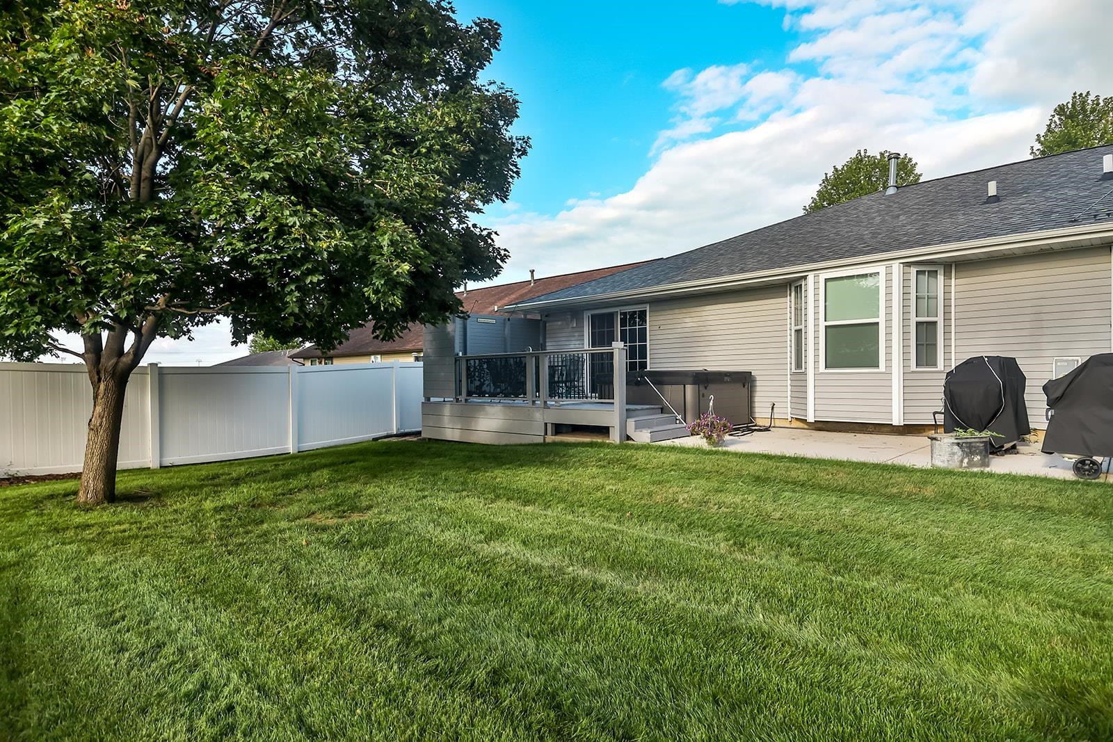 621 Grove Street Pecatonica, IL 61063 - Photo 4 of 26 a view of a house with backyard and a tree