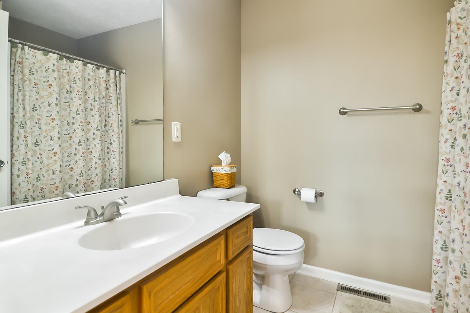 621 Grove Street Pecatonica, IL 61063 - Photo 8 of 26 a bathroom with a granite countertop sink toilet and shower