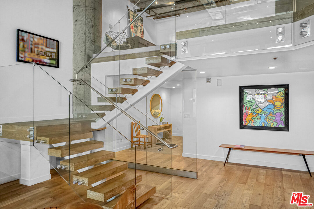 1855 Industrial Street, Unit 112 Los Angeles, CA 90021 - Photo 9 of 51 a view of entryway and hall with wooden floor