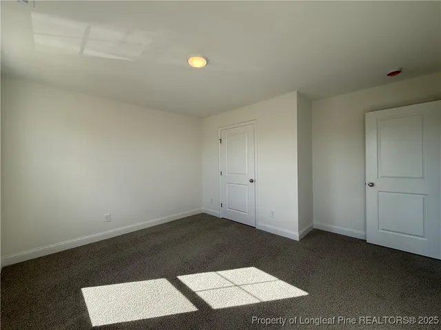 an empty room with a bench