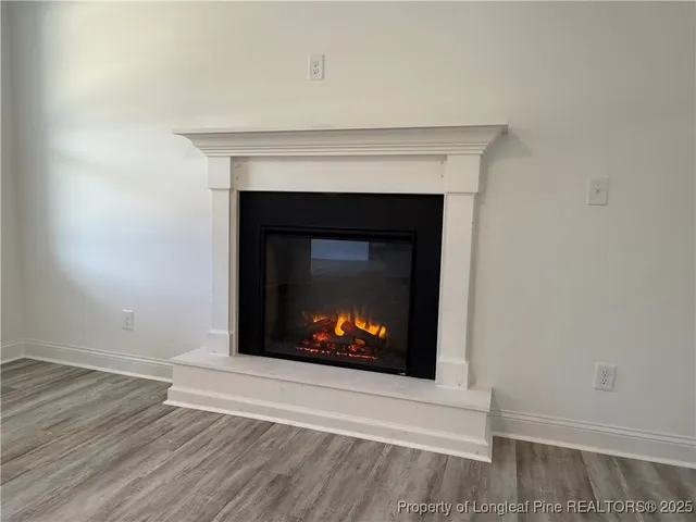 a living room with a fireplace
