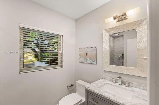 a view of a workspace with furniture