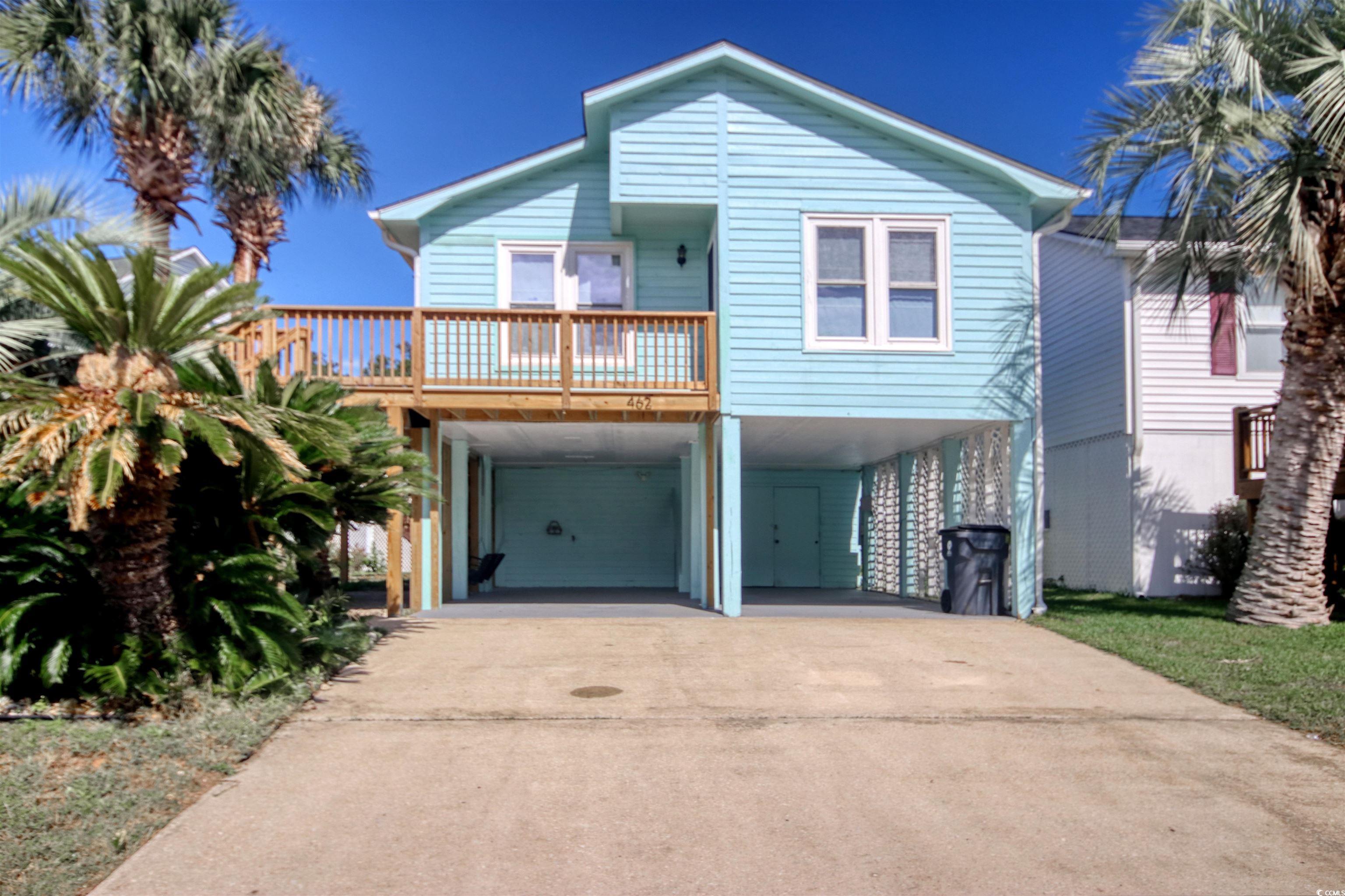 462 Bay Drive Murrells Inlet, SC 29576 - Photo 1 of 37 Coastal inspired home with a carport and driveway