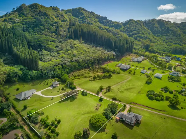 a view of a pool with a yard