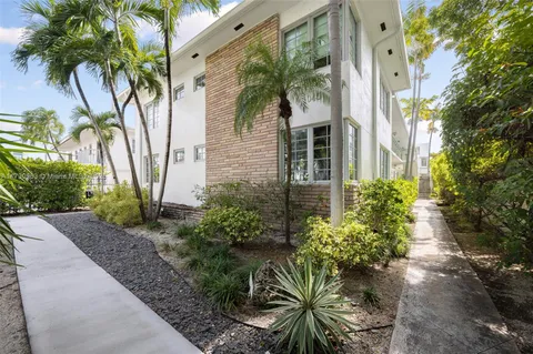 a plant that is in front of a house