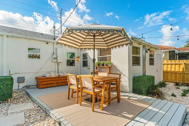 a view of a swimming pool with a patio