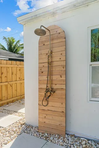 a view of a pathway of a house with wooden floor