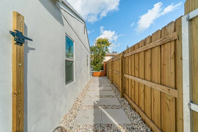 a view of dining room with furniture and wooden floor