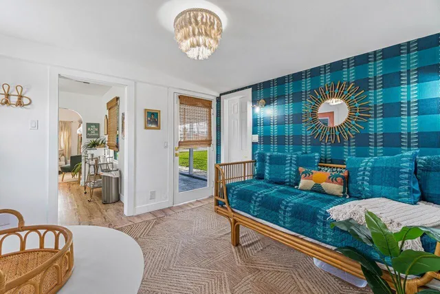 a view of a livingroom with furniture and window