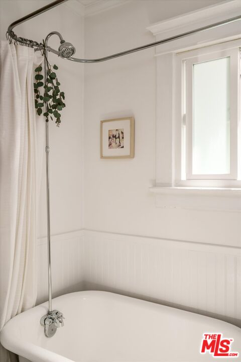 6036 Eucalyptus Lane Los Angeles, CA 90042 - Photo 19 of 34 a bathroom with a bathtub and shower