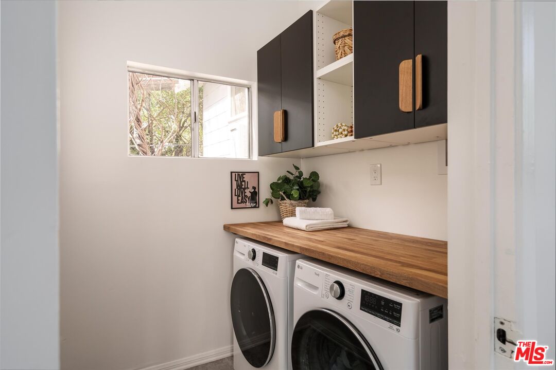 6036 Eucalyptus Lane Los Angeles, CA 90042 - Photo 25 of 34 a utility room with dryer and washer