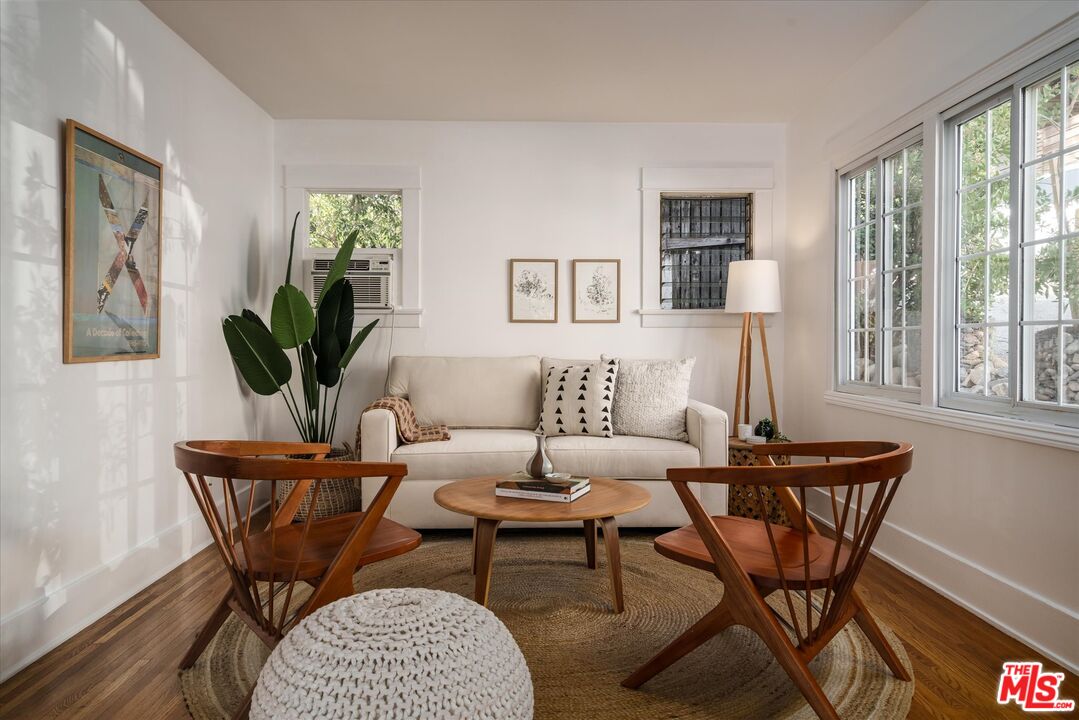 6036 Eucalyptus Lane Los Angeles, CA 90042 - Photo 4 of 34 a living room with furniture a table and a potted plant
