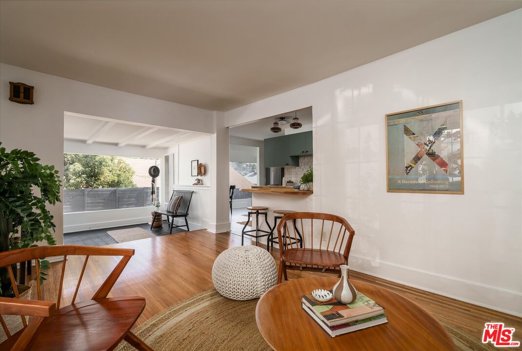 6036 Eucalyptus Lane Los Angeles, CA 90042 - Photo 8 of 34 a living room with furniture and a table