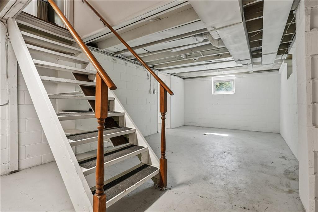 4940 3rd Street Verona, PA 15147 - Photo 21 of 27 a view of staircase with wooden floor and white walls