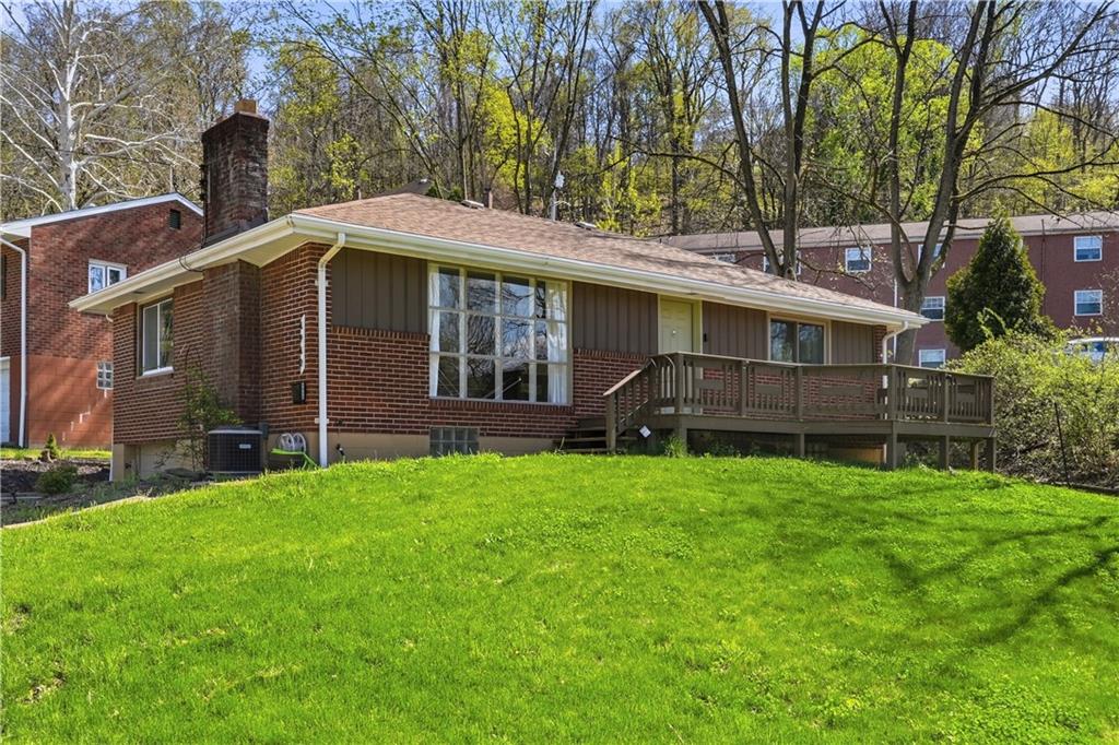 4940 3rd Street Verona, PA 15147 - Photo 3 of 27 a front view of a house with a garden
