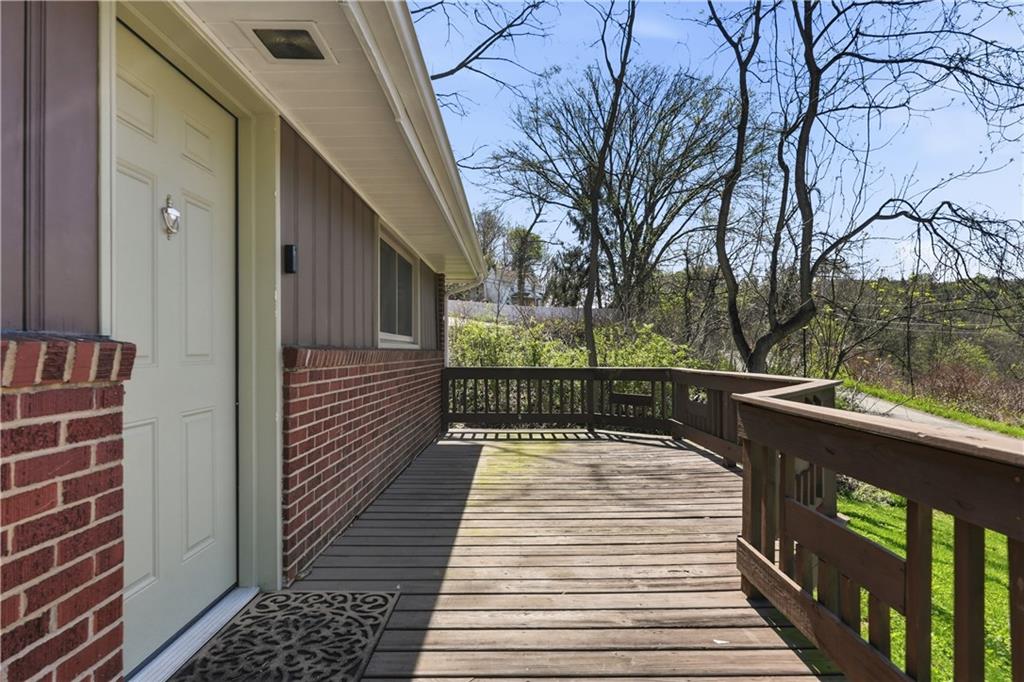 4940 3rd Street Verona, PA 15147 - Photo 4 of 27 a view of balcony with wooden floor and outdoor space