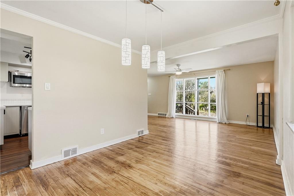 4940 3rd Street Verona, PA 15147 - Photo 10 of 27 a view of an empty room with wooden floor and a window