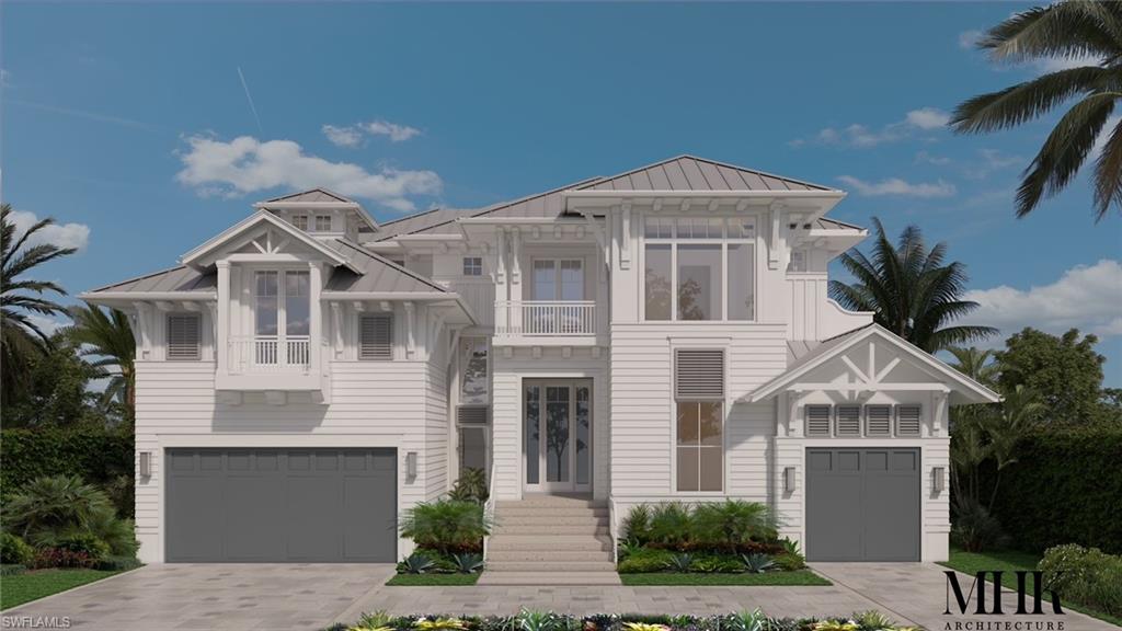 1900 Kingfish Road Naples, FL 34102 - Photo 2 of 11 a front view of a house with a yard