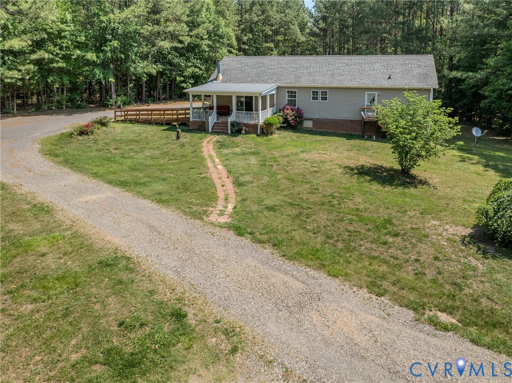8025 Colemans Lake Road Church Road, VA 23850 - Photo 20 of 21 a view of a house with backyard and garden