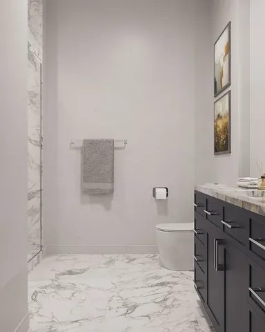 a bathroom with a sink a toilet and mirror