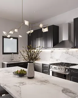 a kitchen with stainless steel appliances a sink and a stove